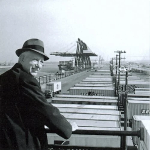 Malcolm McLean at a container-terminal railing