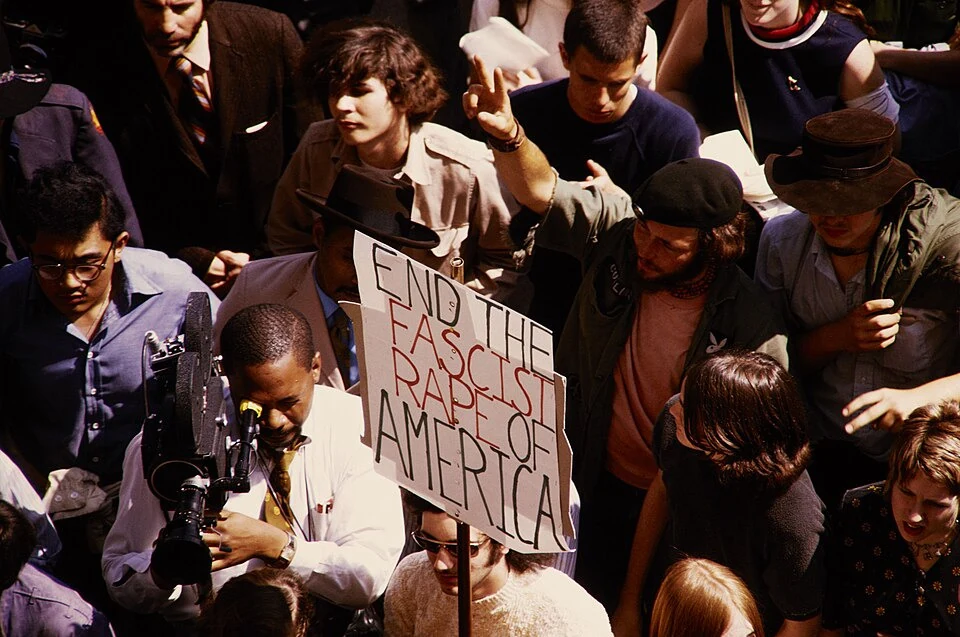 Protesters at the first Earth Day flag ceremony