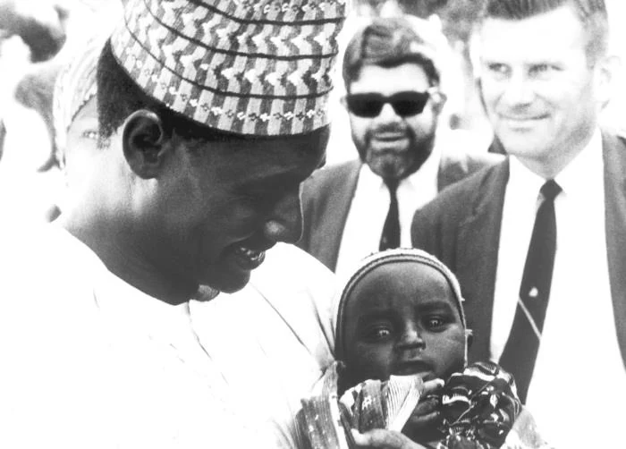 A father and child at a vaccination milestone